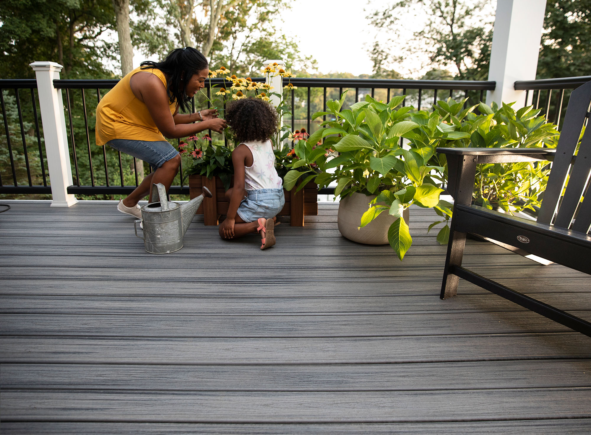 woman with child on a deck with trex decking